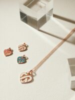 Pendentif Poiray Coeur Entrelacé Moyen Modèle Or Rose Et Émail Ivoire