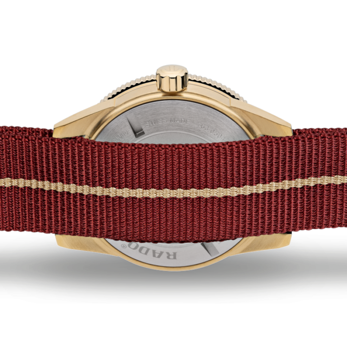 Montre Rado Captain Cook Automatic Bronze Cadran Rouge Bracelet Tissu 42MM